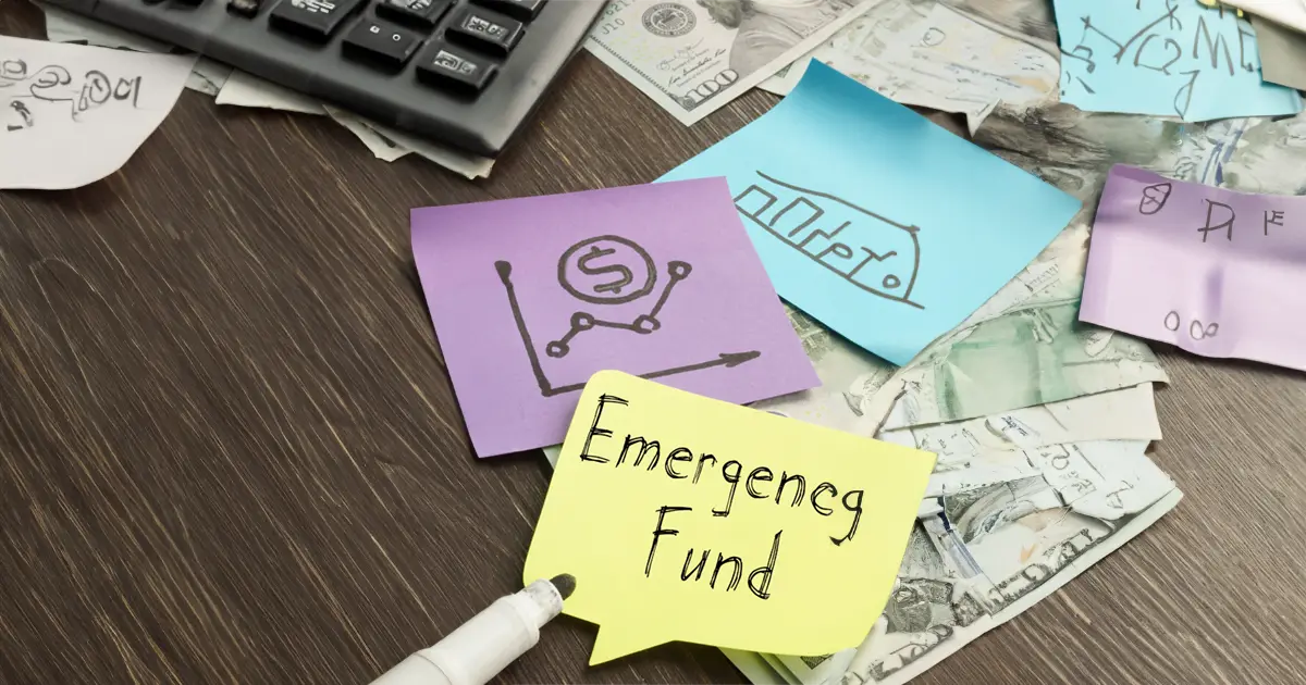 pieces of paper indicating an emergency fund