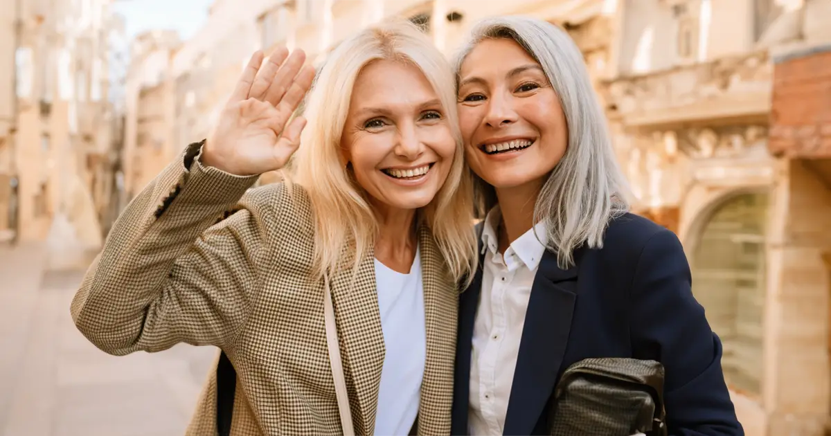 Two women smiling at the camera