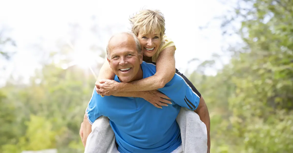 Woman being piggybacked by a man