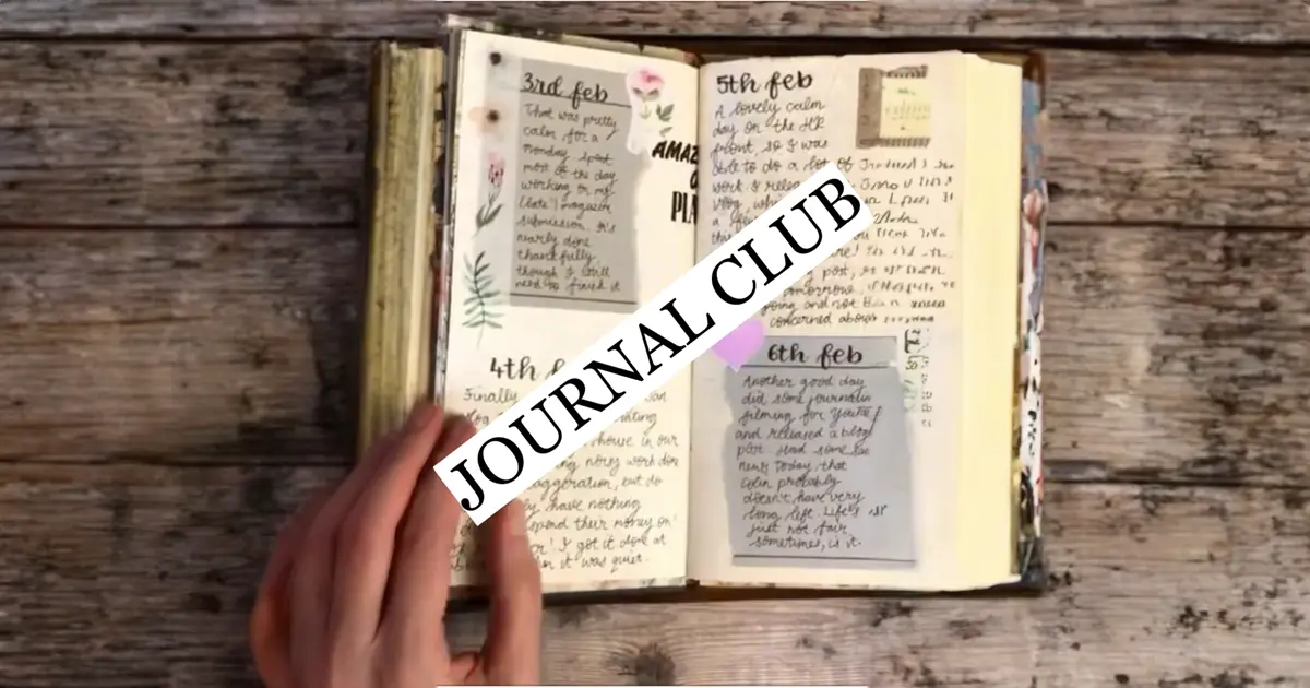 A journal is open with writing and pictures of flowers and the words ‘Journal Club’ in large font is pasted over the top