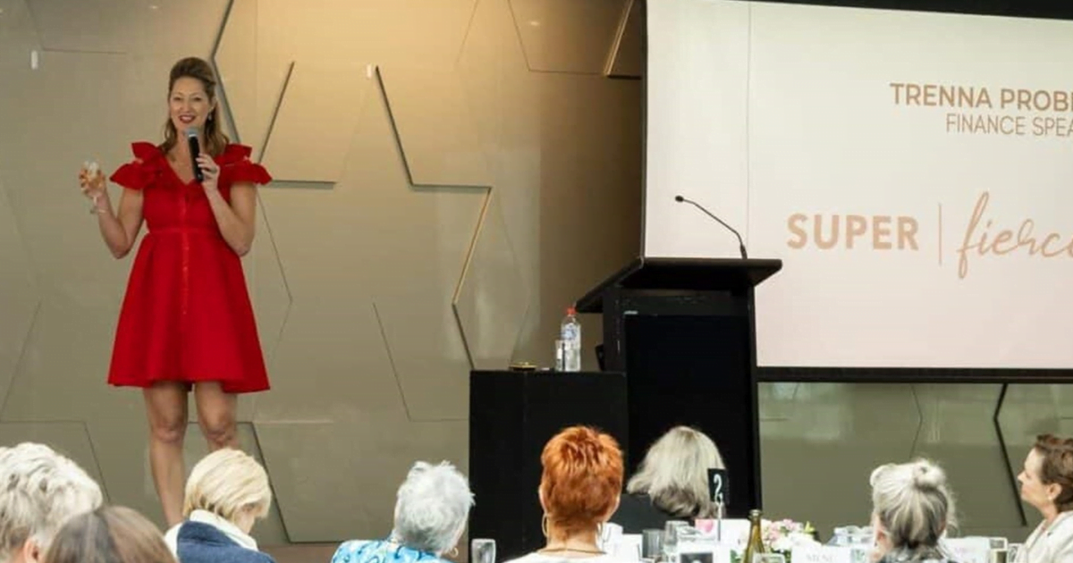 Trenna Probert on stage at a Women in Bloom event.