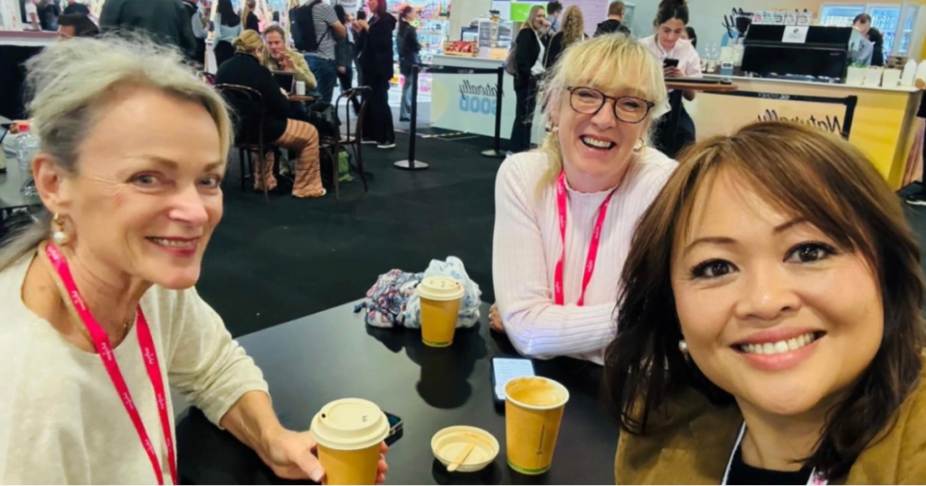 Annie, Caroline and Alexis enjoying a coffee at the Naturally Good Expo in Sydney. 