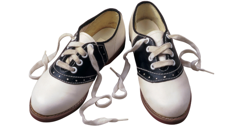 A 1950’s style navy and white pair of saddle shoes. 